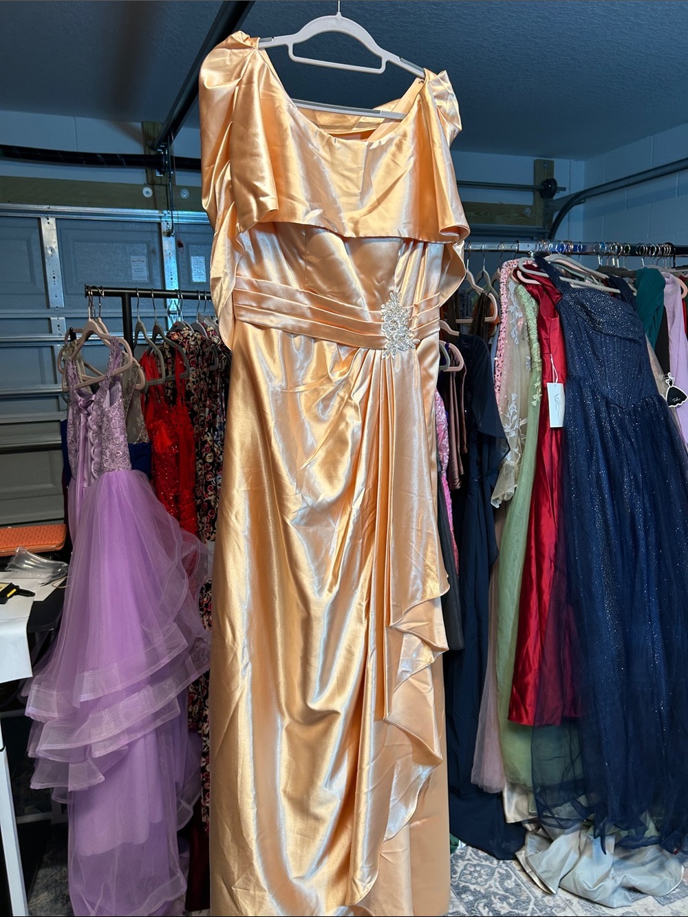 Elegant Gold Satin Evening Gown with Draped Ruffle Detail